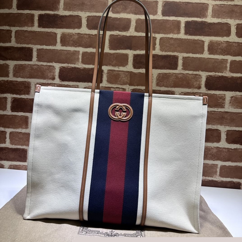 G*u*i shopping bags
